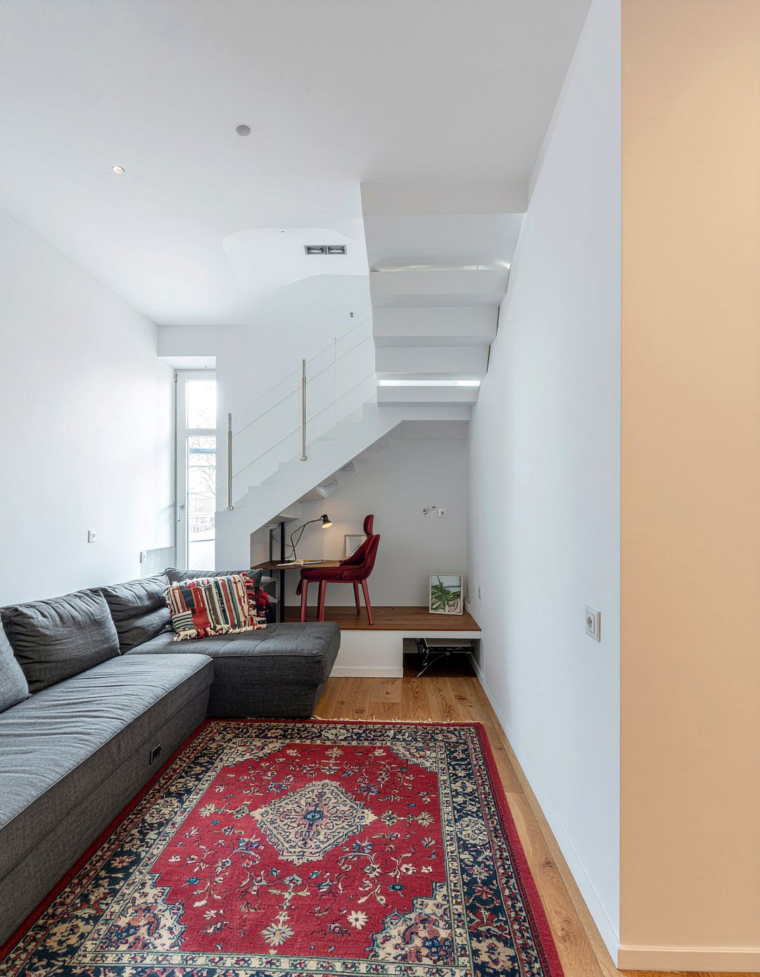 Living room with stairs in the middle - 30 oddly shaped living room ideas