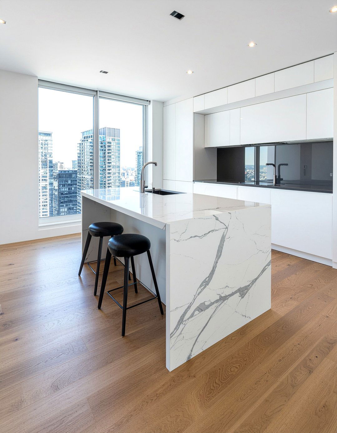 Marble Waterfall Island - 30 penthouse kitchen ideas