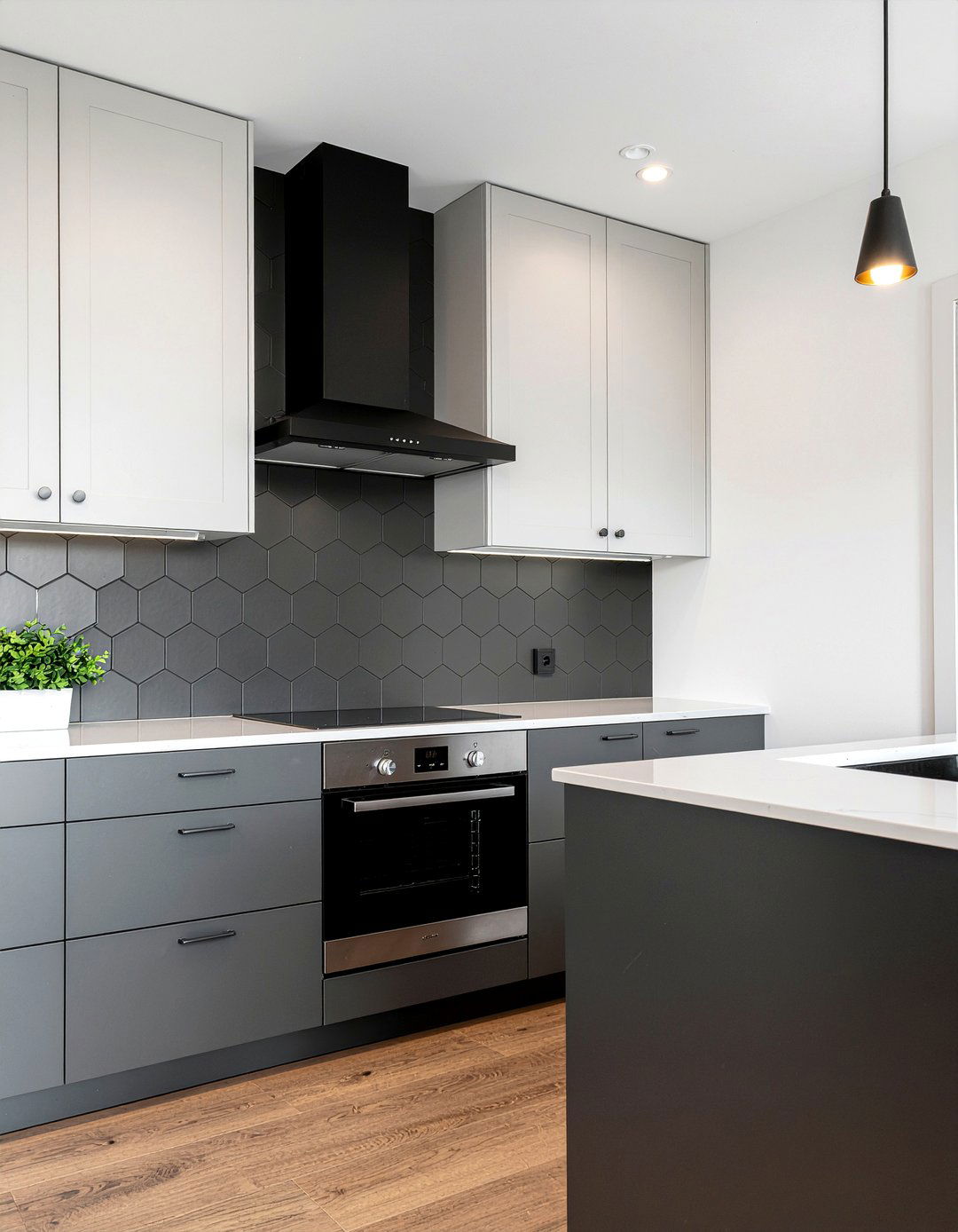 Matte black hexagon tile - 30 mosaic tile kitchen backsplash ideas