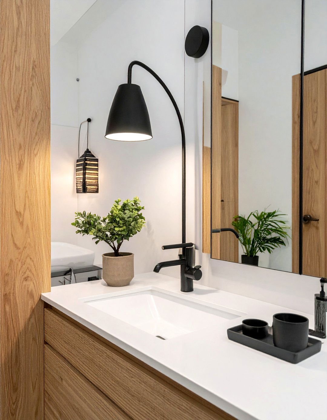 Matte black vanity light - 30 bathroom sconce ideas