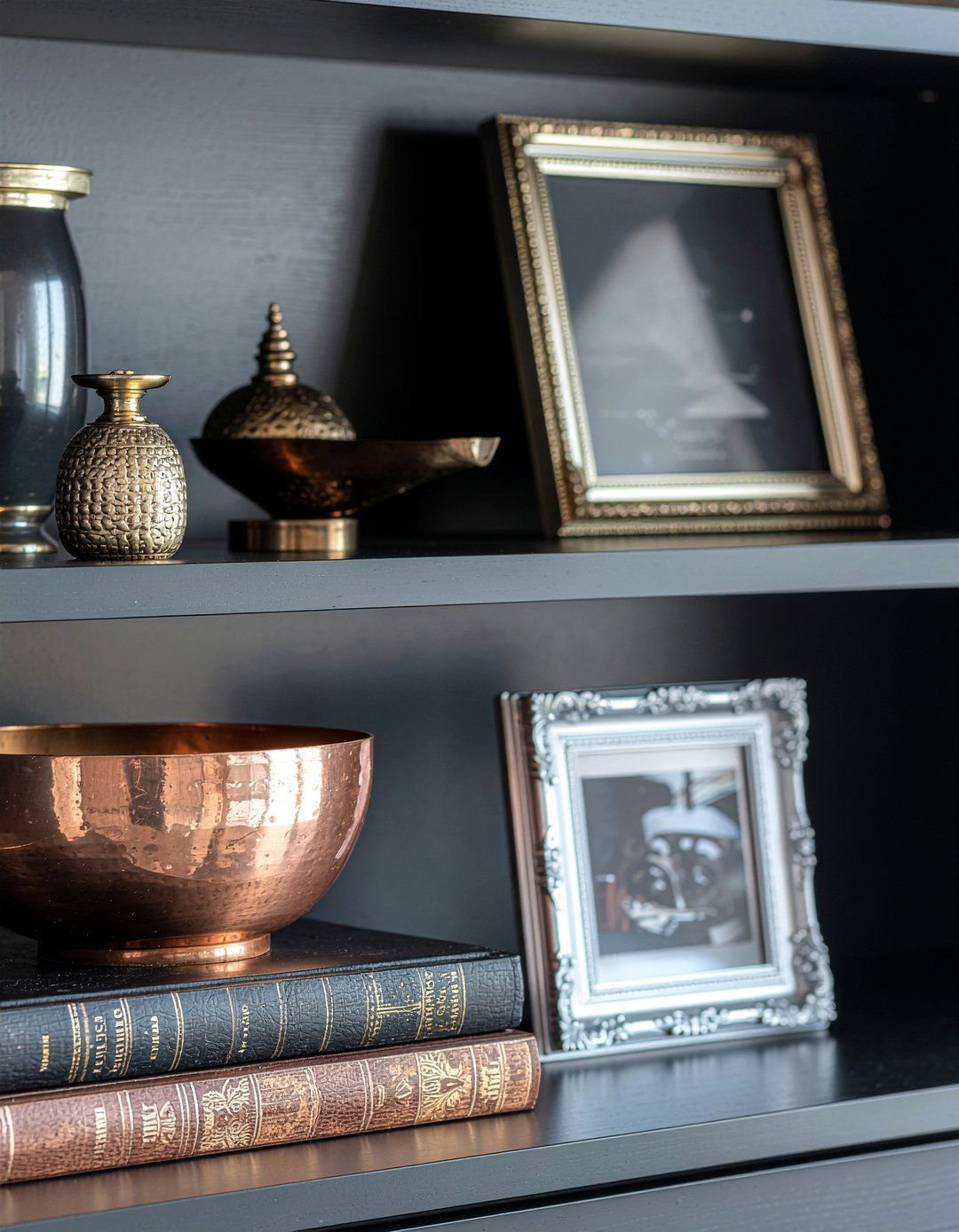 Metallic shelf accents - 30 living room bookshelf styling ideas