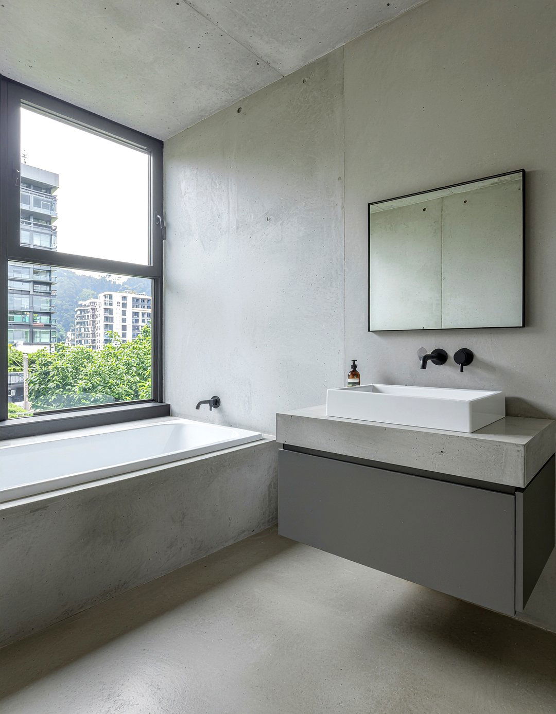 Minimalist concrete bathroom - 30 hotel bathroom ideas