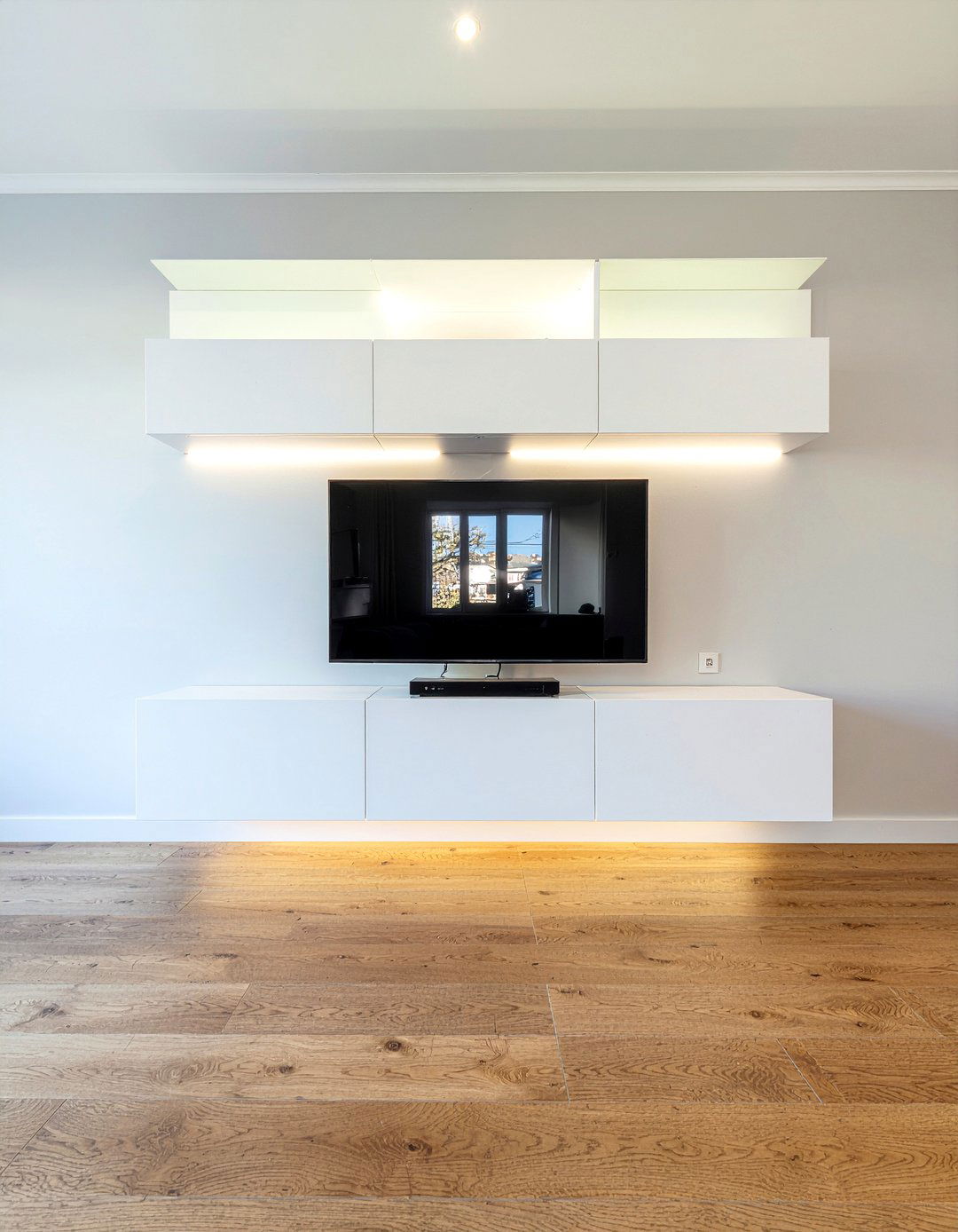 Modern floating entertainment center - 30 living room wall unit ideas