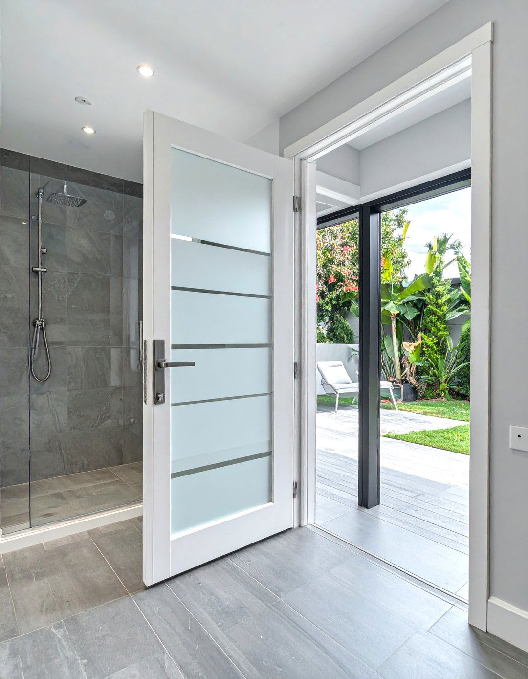 Multi panel frosted door - 30 bathroom pocket door ideas