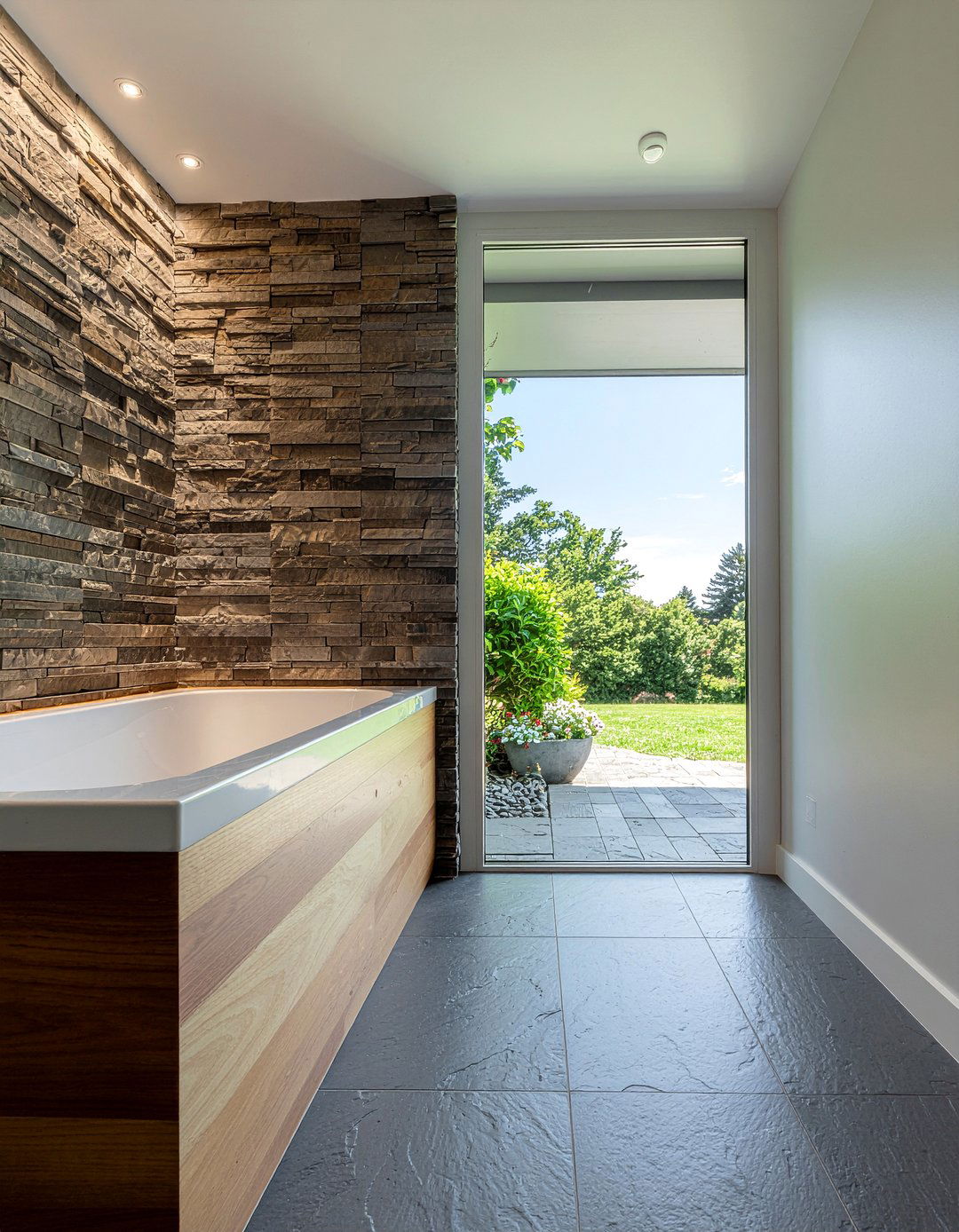 Natural stone flooring - 30 hotel bathroom ideas