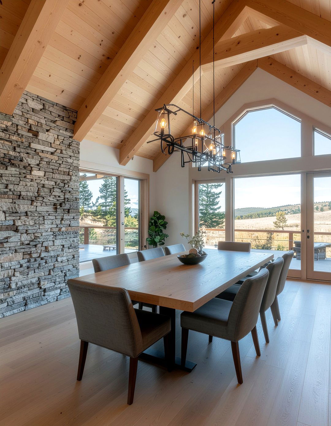 Natural stone wall dining room high ceiling - 30 dining room vaulted ceiling ideas