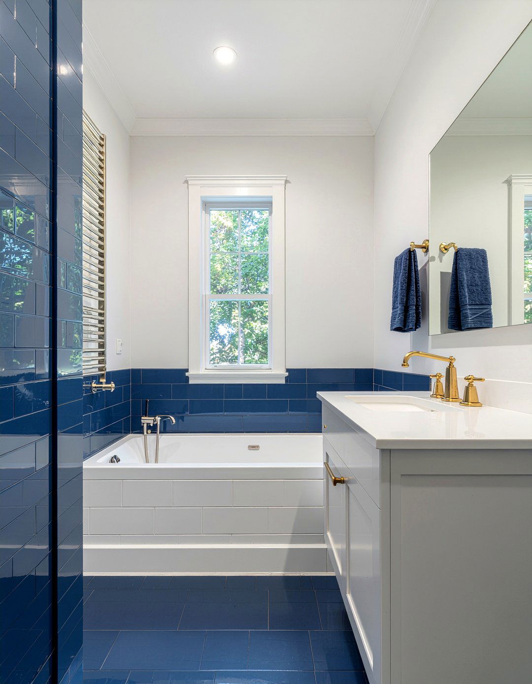 Navy blue bathroom tile - 30 floor to ceiling tile bathroom ideas