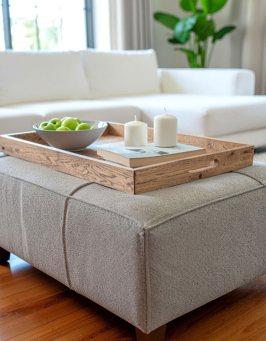 Oversized tray on cocktail ottoman - 30 living room tray ottoman ideas