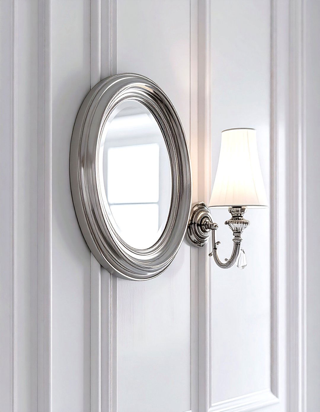 Polished Nickel Sconce - 30 metal bathroom ideas