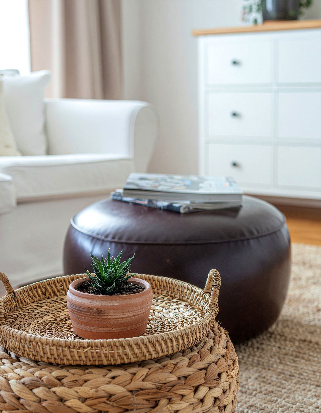 Rattan tray on leather ottoman - 30 living room tray ottoman ideas
