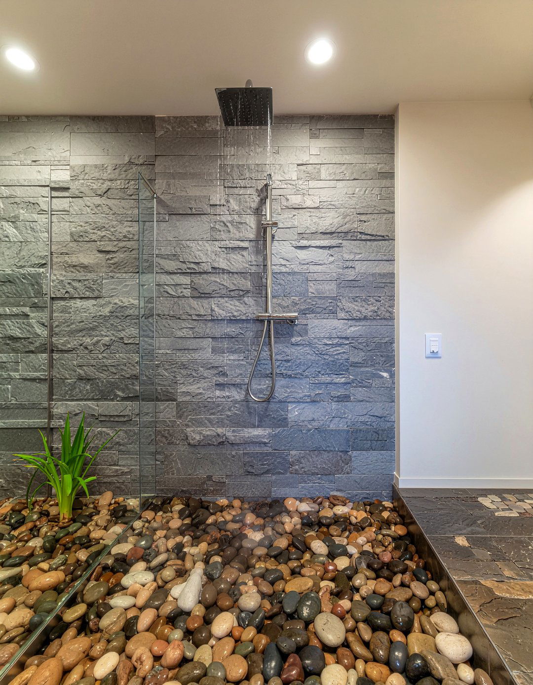 River rock shower - 30 mountain bathroom ideas