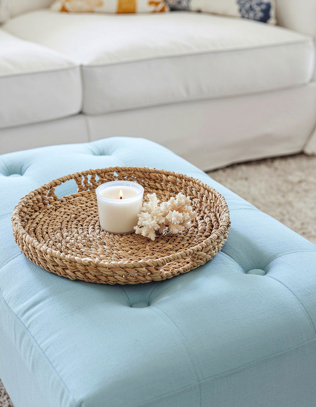Seagrass tray on coastal ottoman - 30 living room tray ottoman ideas