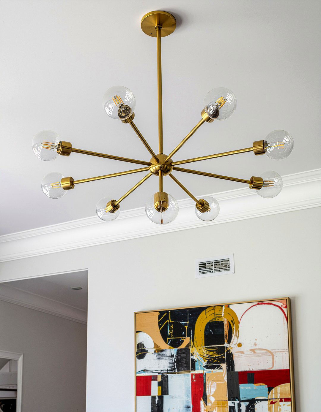 Sputnik chandelier lighting - 30 mid-century glam living room ideas