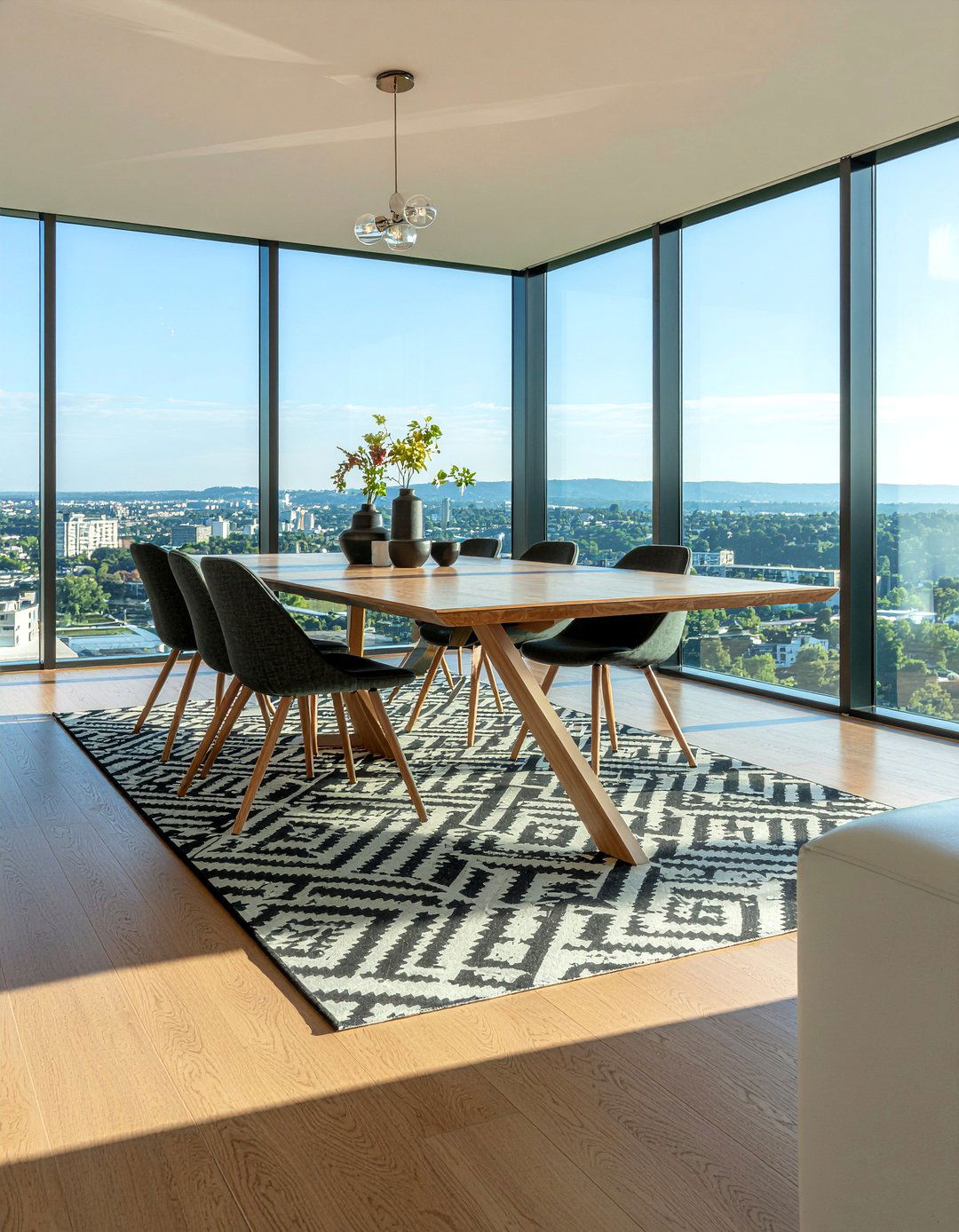 Statement rug under dining table - 30 penthouse dining room ideas