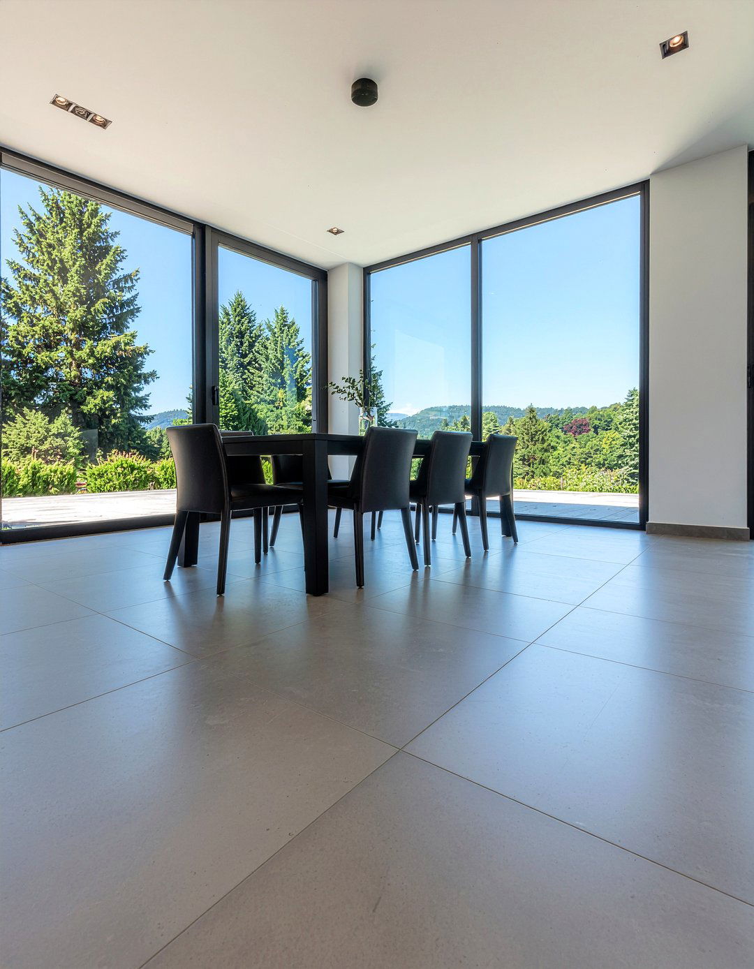 Stone tile dining floor - 30 durable dining room ideas