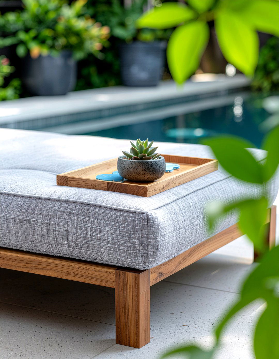Teak tray on outdoor ottoman - 30 living room tray ottoman ideas