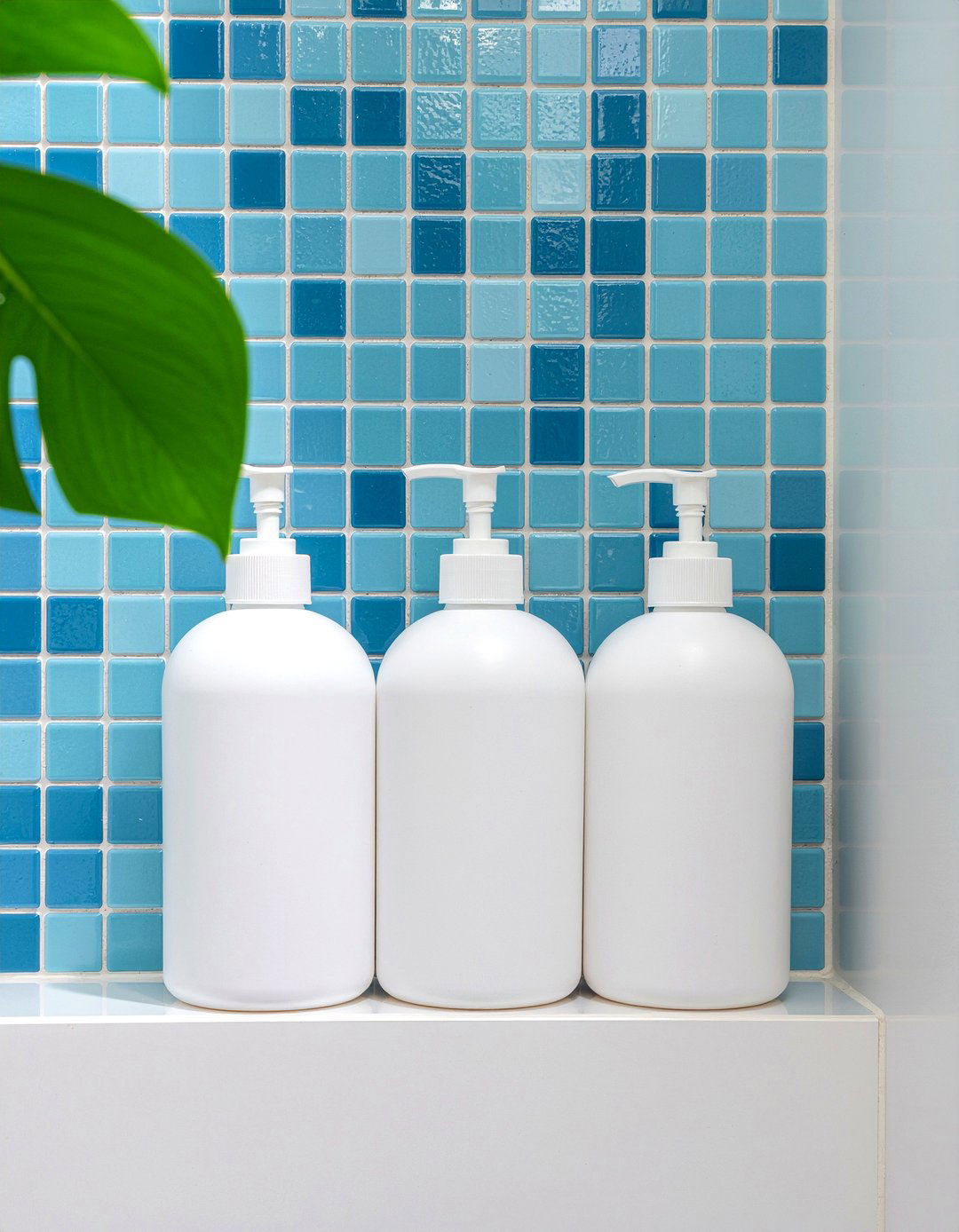 Tiled shower niche with bottles - 30 bathroom layering ideas