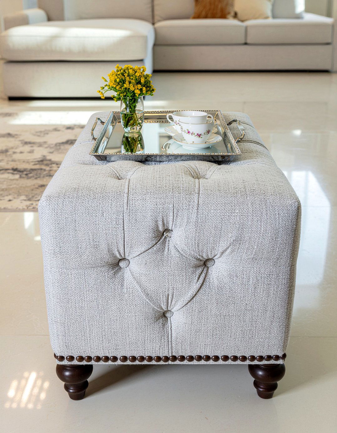 Tufted Ottoman - 30 glam living room ideas