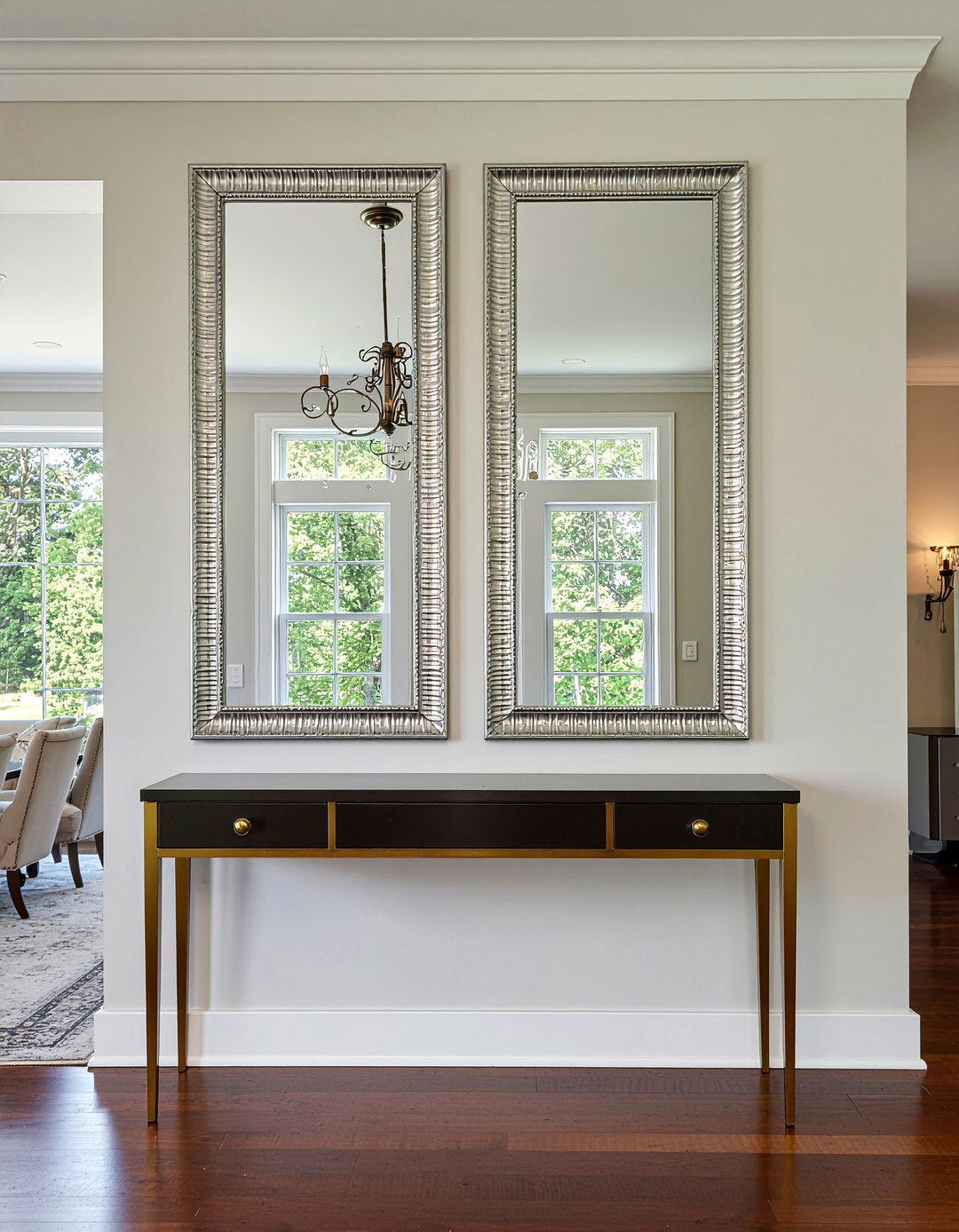 Twin Mirrors Over Credenza - 30 dining room symmetry ideas