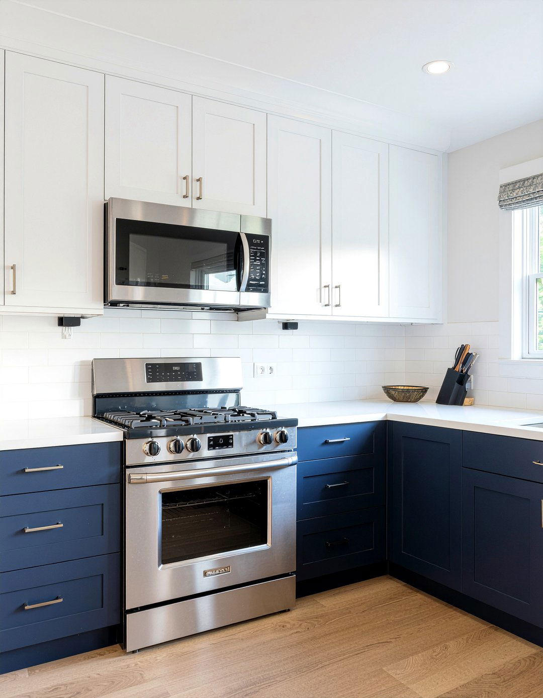 Two tone kitchen cabinets with microwave over stove - 30 over-the-range microwave kitchen ideas