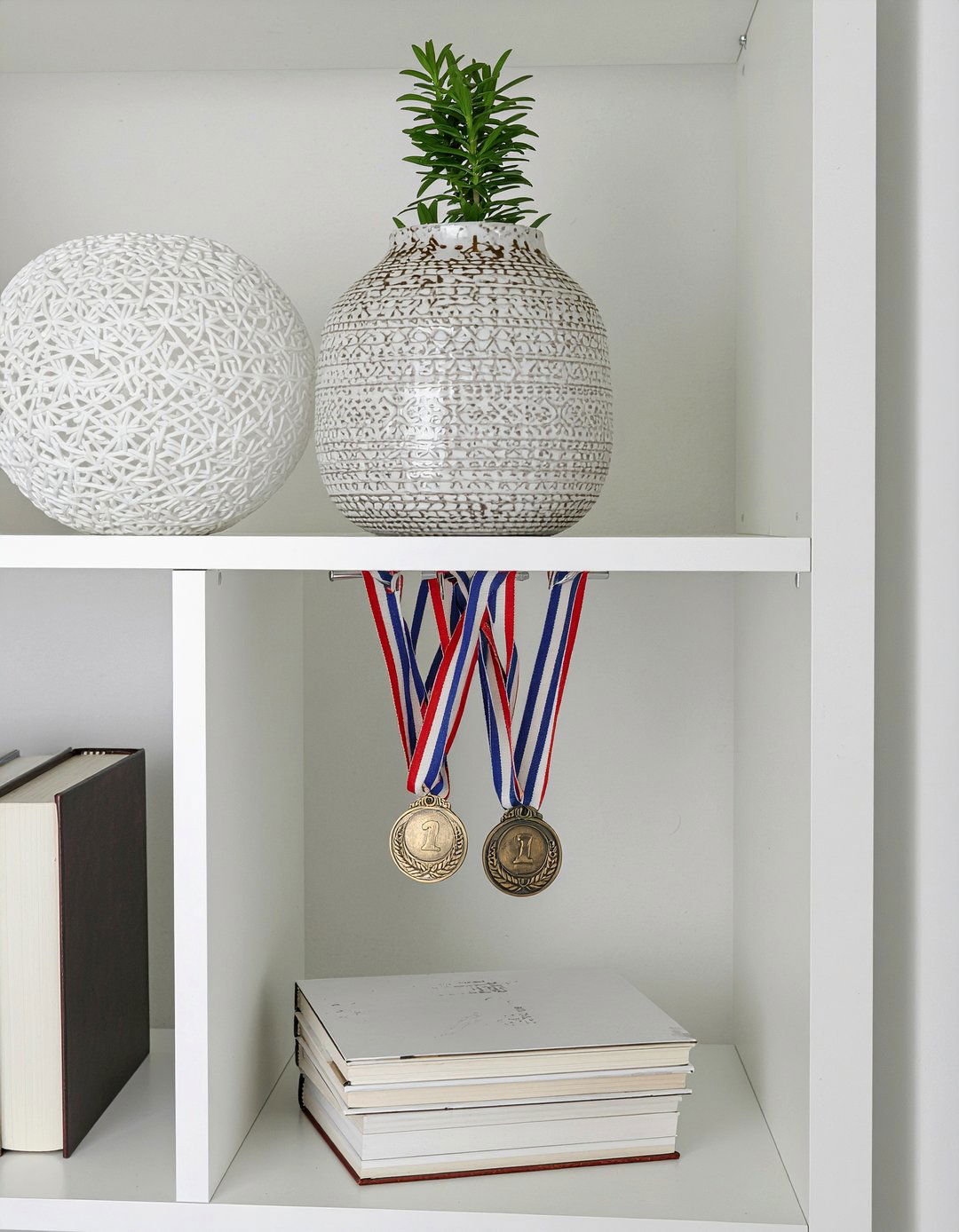 Under shelf medal hooks - 30 bedroom medal display ideas