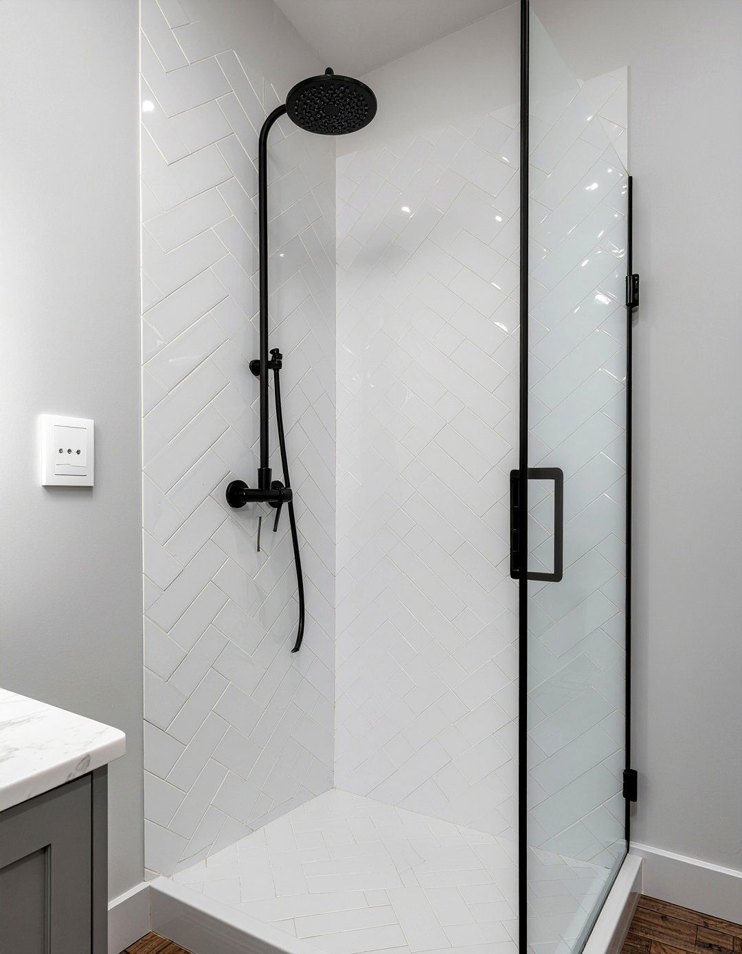 Vertical herringbone tile shower - 30 herringbone tile bathroom ideas