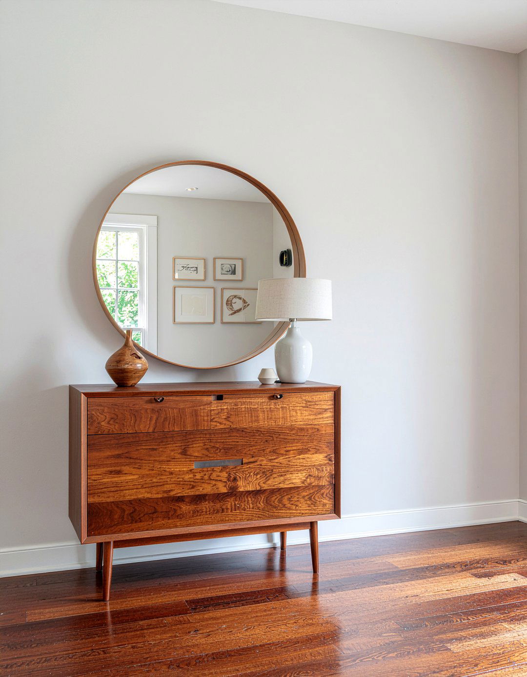 Walnut dresser with circular mirror - 30 bedroom dresser with mirror ideas